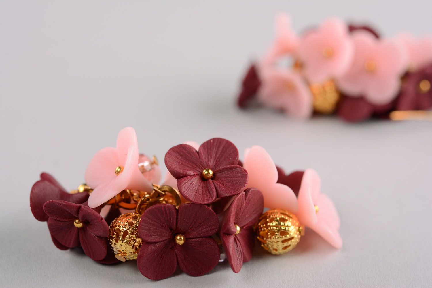 Beautiful earrings in the shape of flowers photo 5