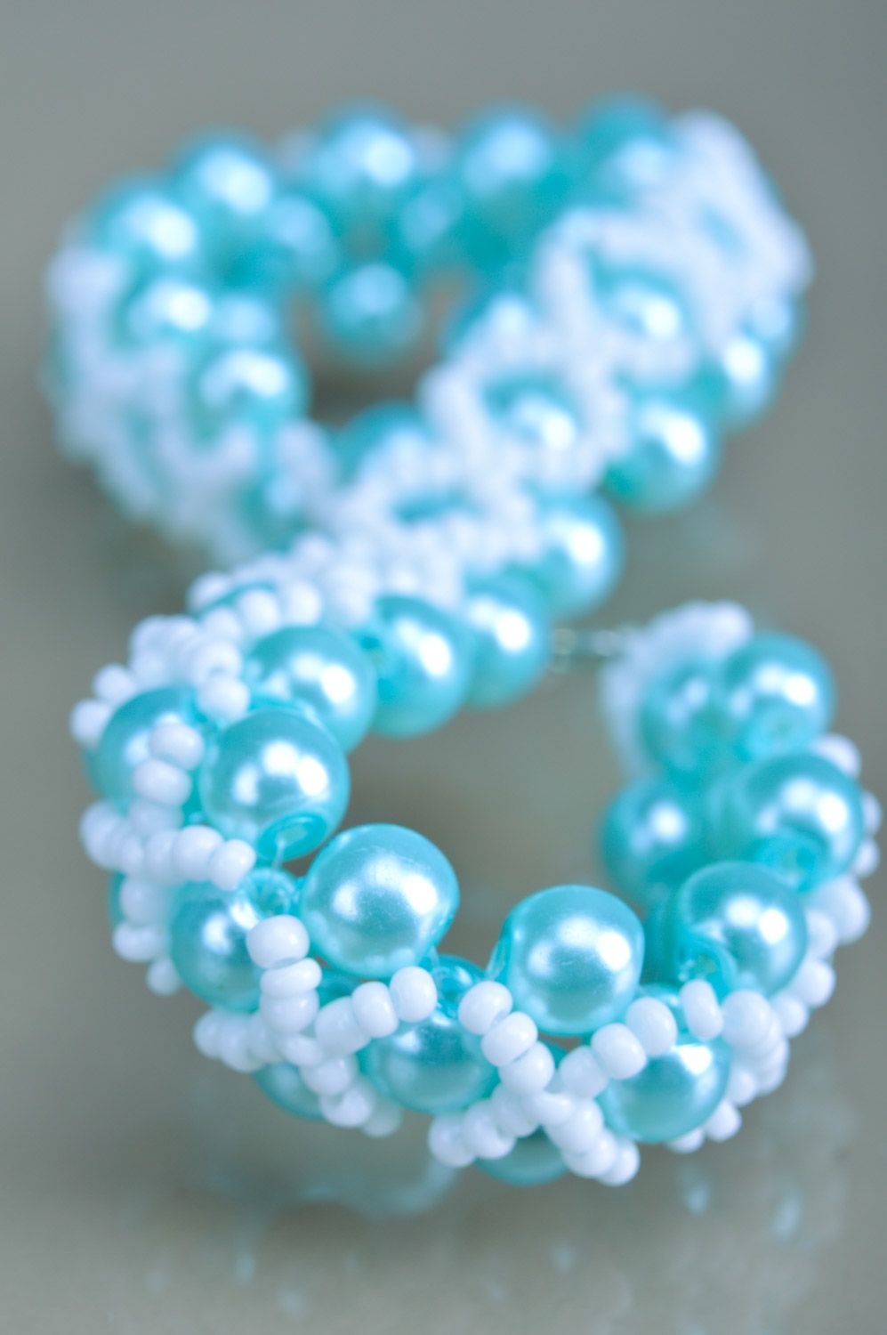 Beautiful handmade wrist bracelet woven of white and blue beads for girls photo 4