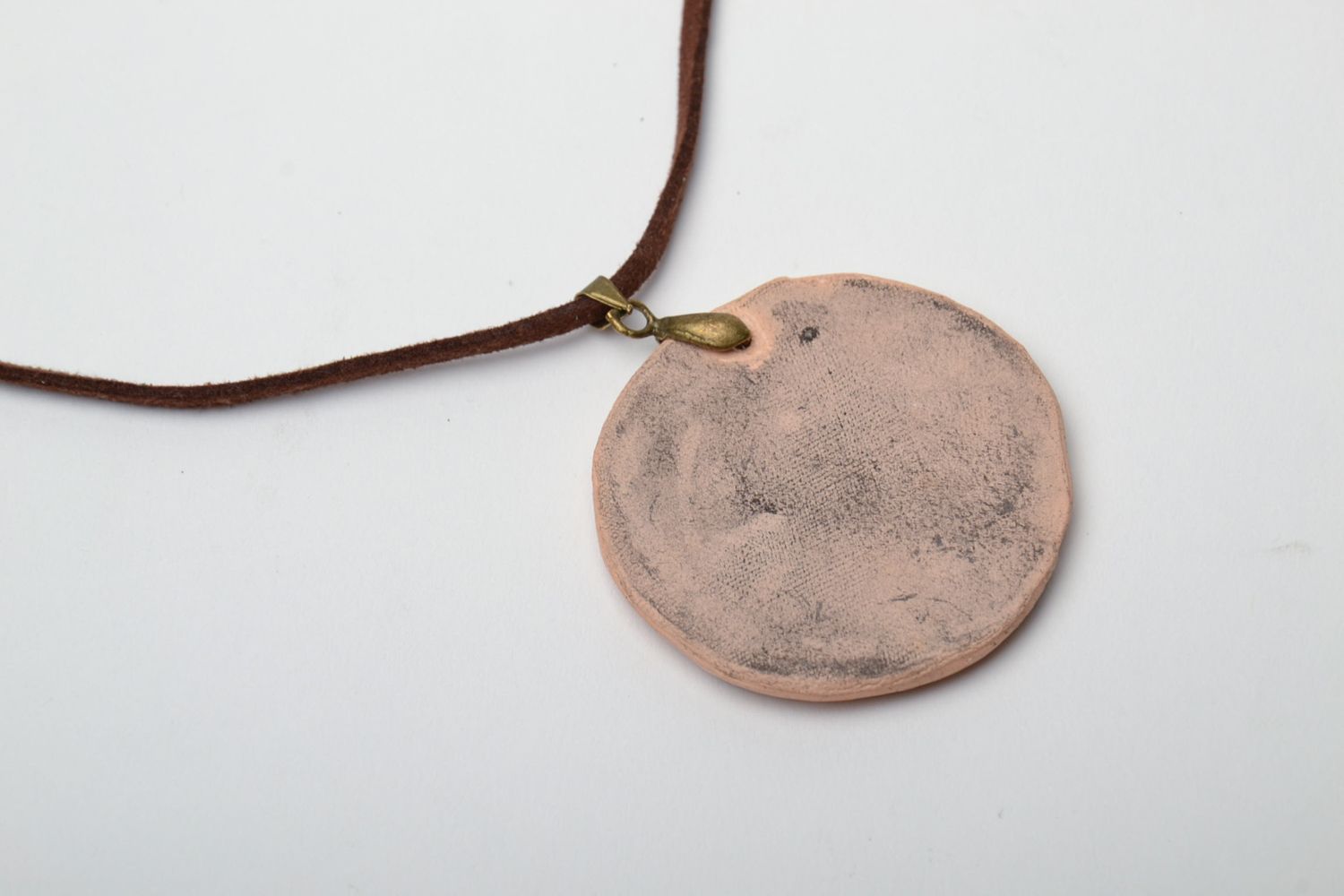 Ceramic pendant with stamps of plants  photo 4