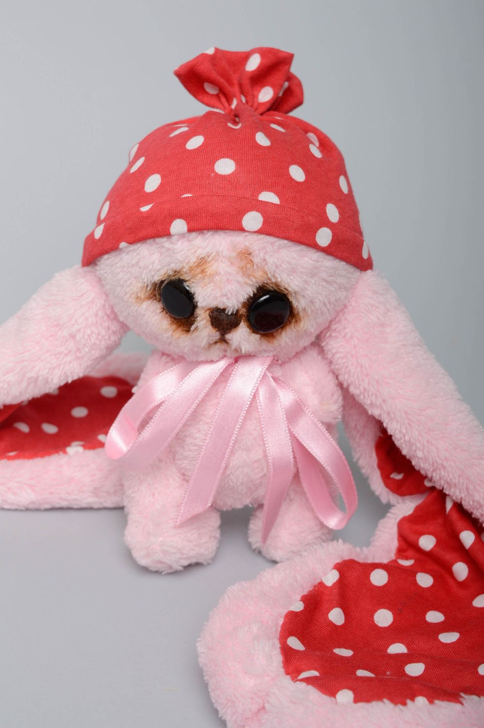 Pink artificial fur toy hare with long ears photo 4
