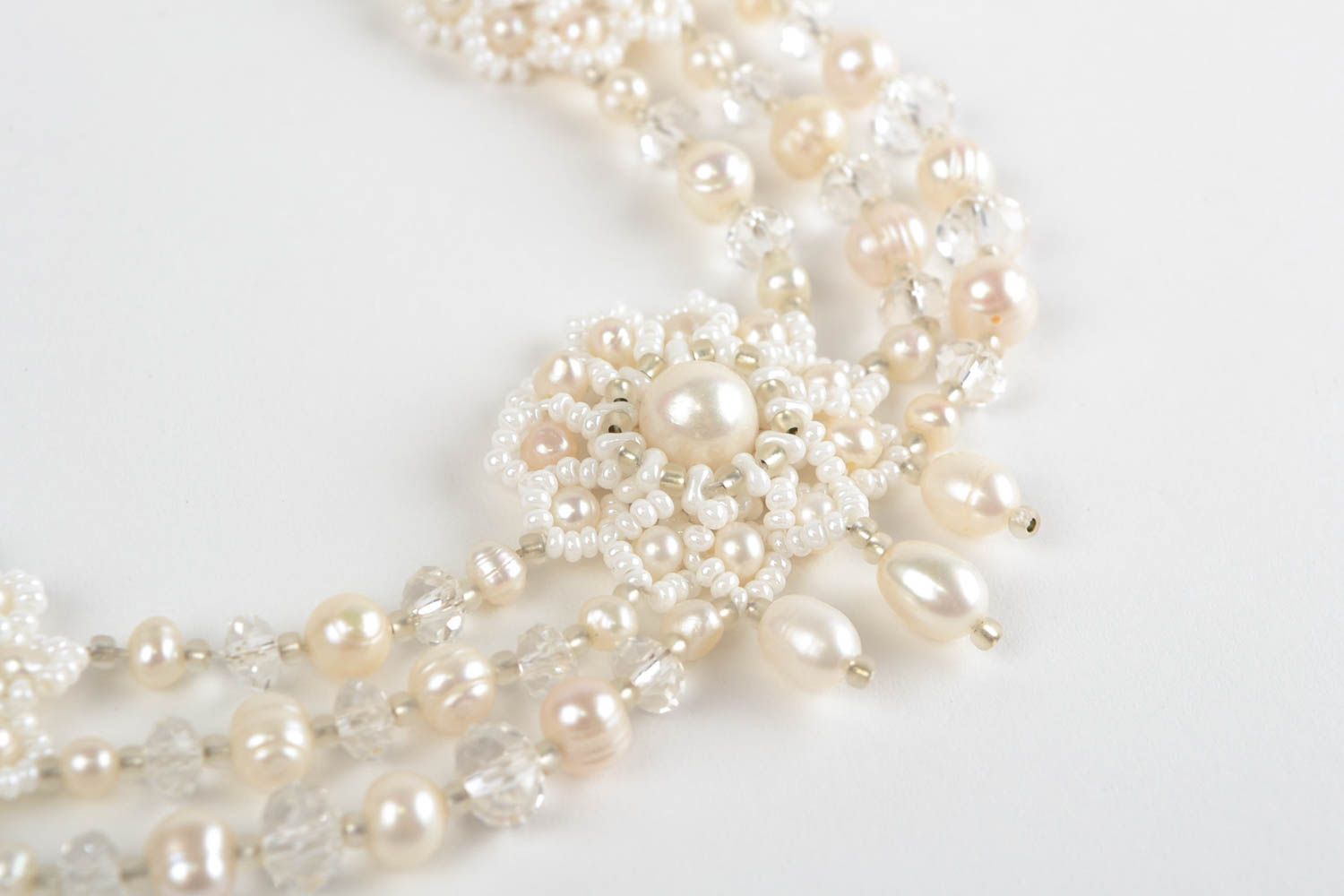 Beautiful festive handmade white necklace made of beads and natural stones photo 3