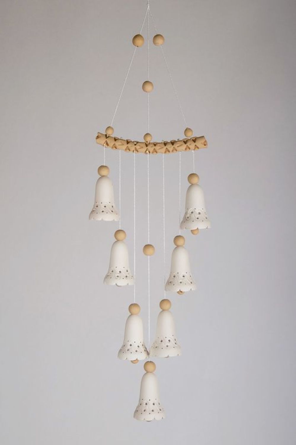White and brown ceramic bells  photo 1