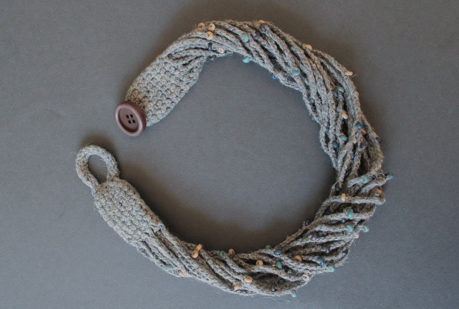 Necklace woven from flax with ceramic beads photo 1