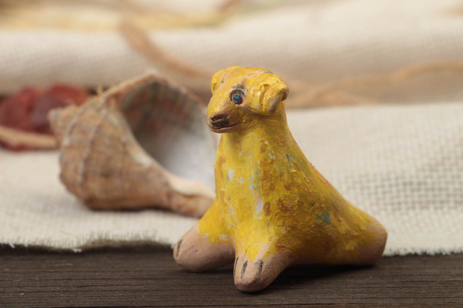 Traditional painted toy whistle in the form of lamb clay statuette for children photo 1