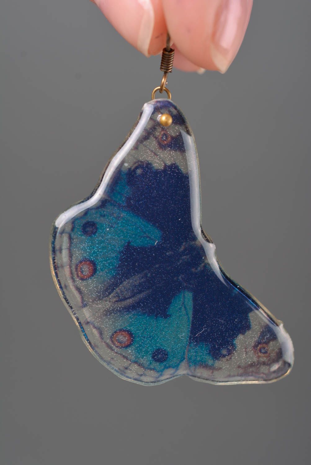 Bright summer handmade earrings of epoxy resin with blue butterflies photo 2