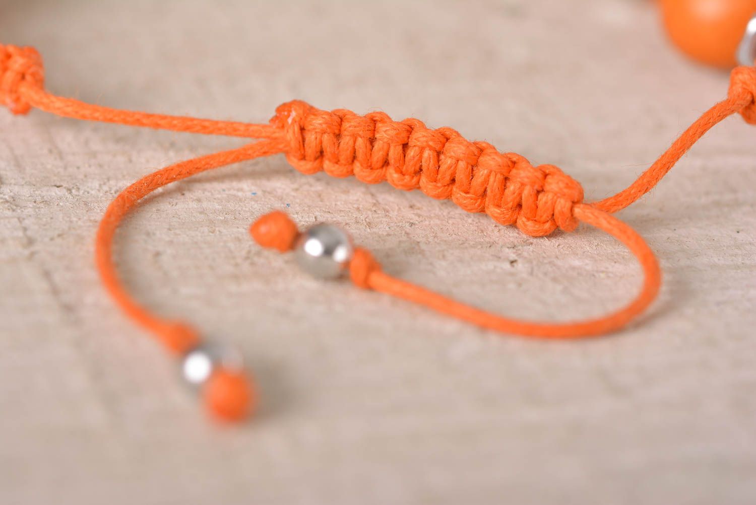 Handmade orange skull beaded orange cord bracelet with female screws photo 4