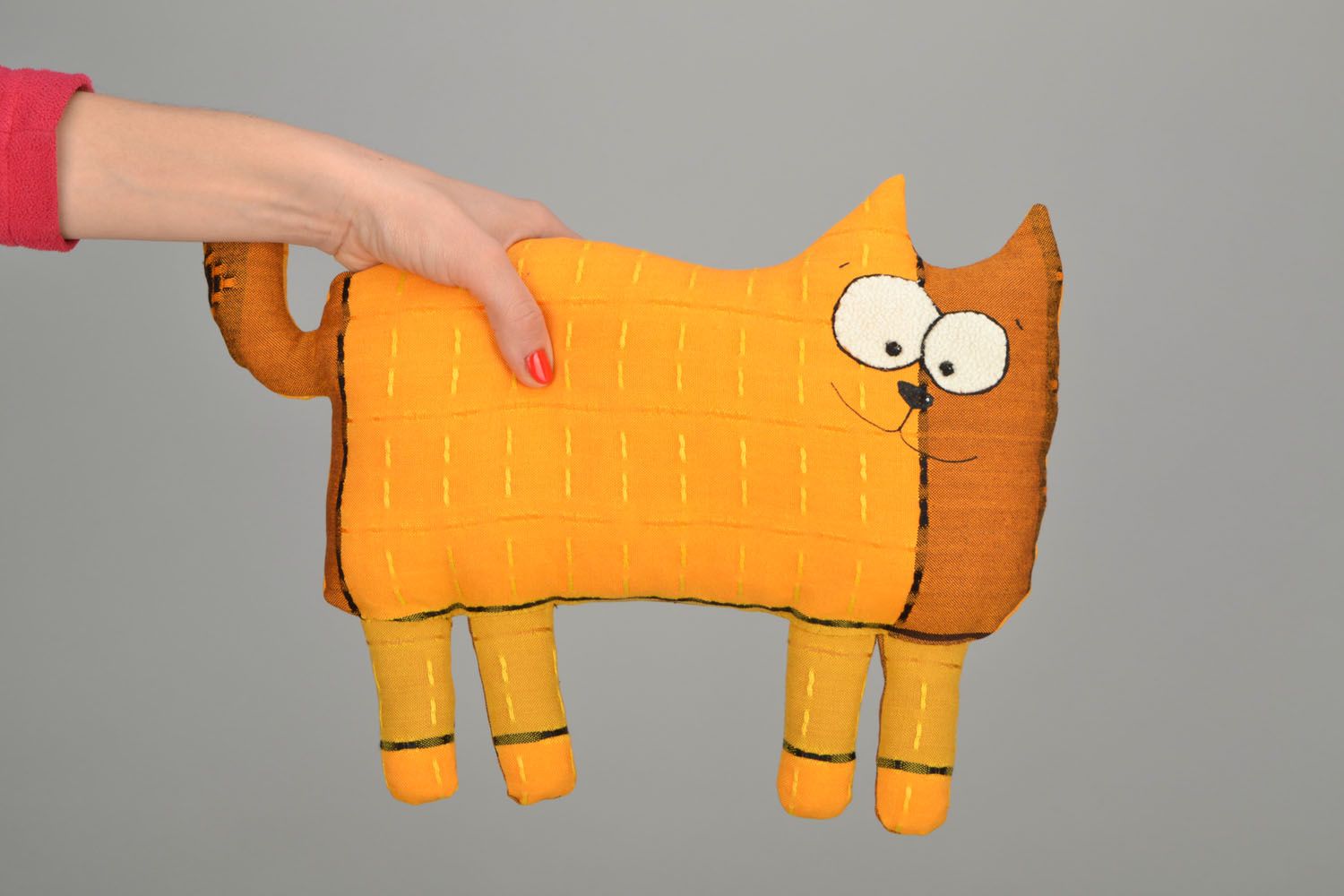 Soft toy in the shape of a cat photo 2