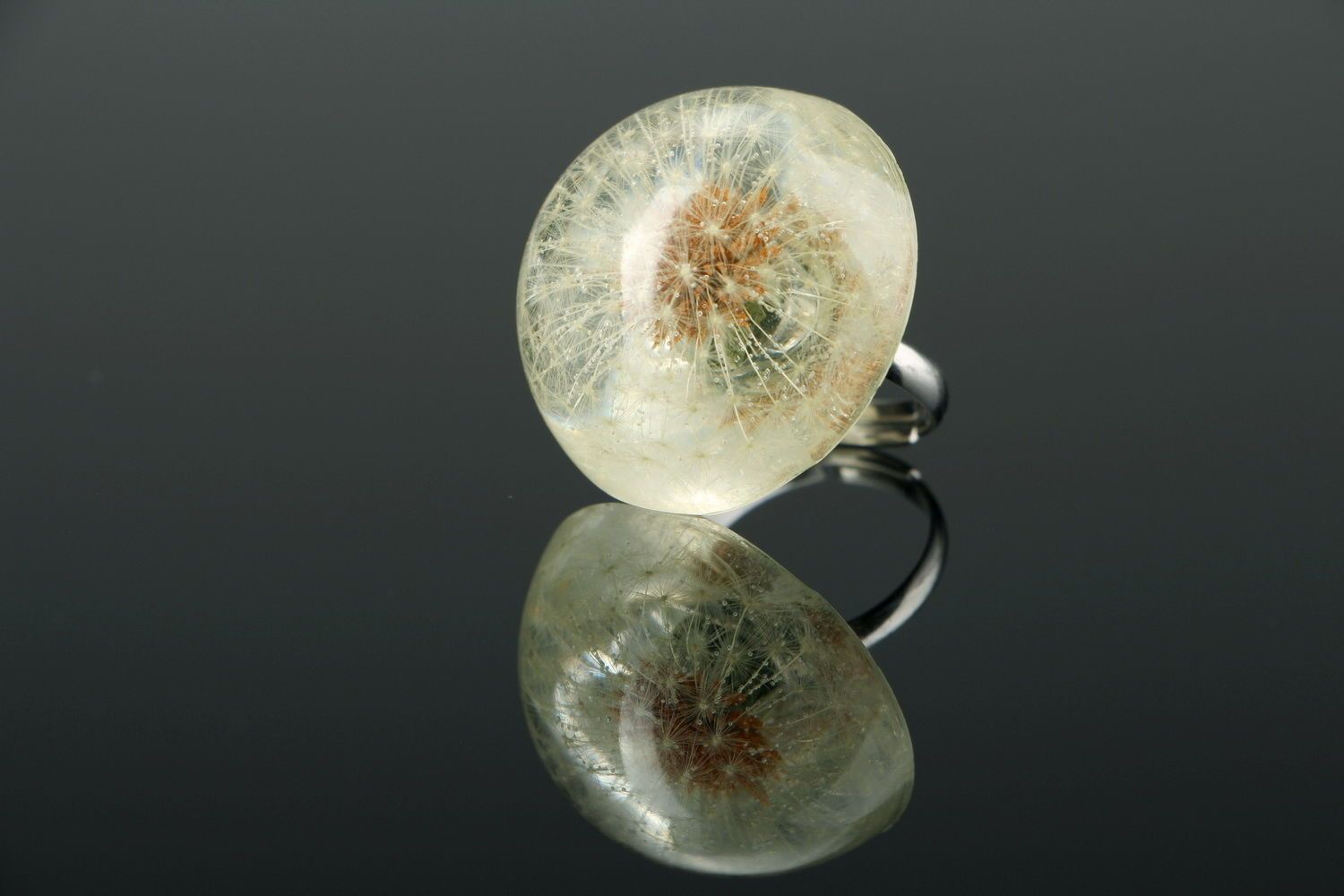Ring made of dandelion and epoxy photo 3