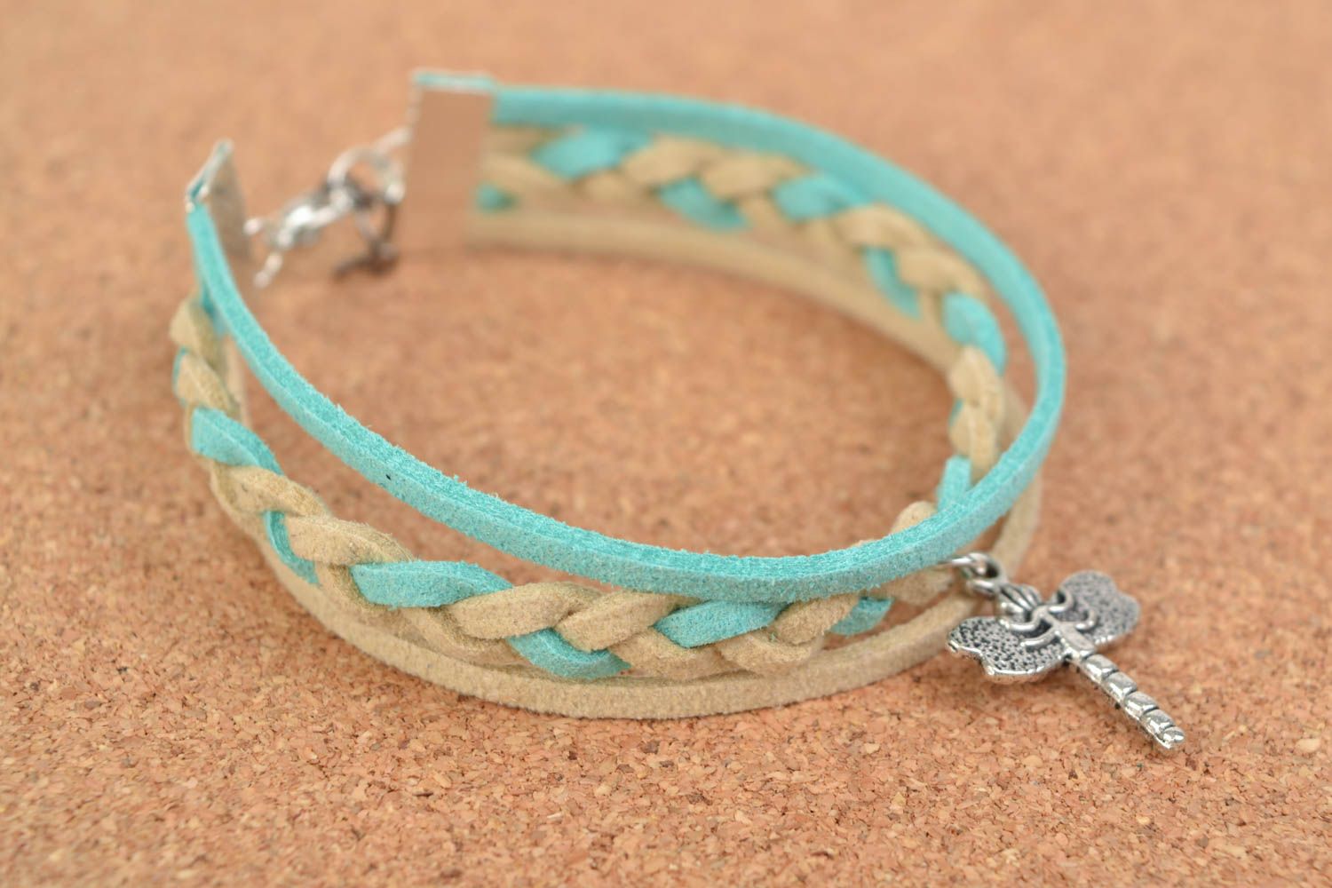 Beautiful stylish light handmade woven suede cord bracelet with charm photo 1