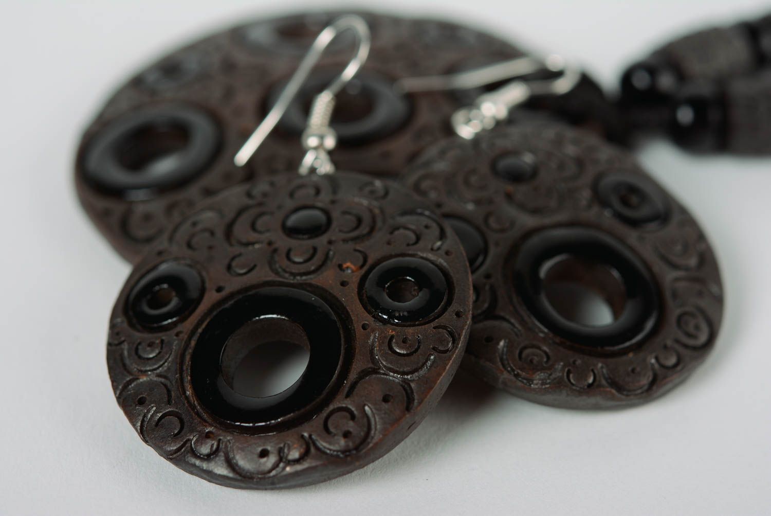 A set of handcrafted black ceramic earrings and necklace made of clay with colored enamel paintings photo 3