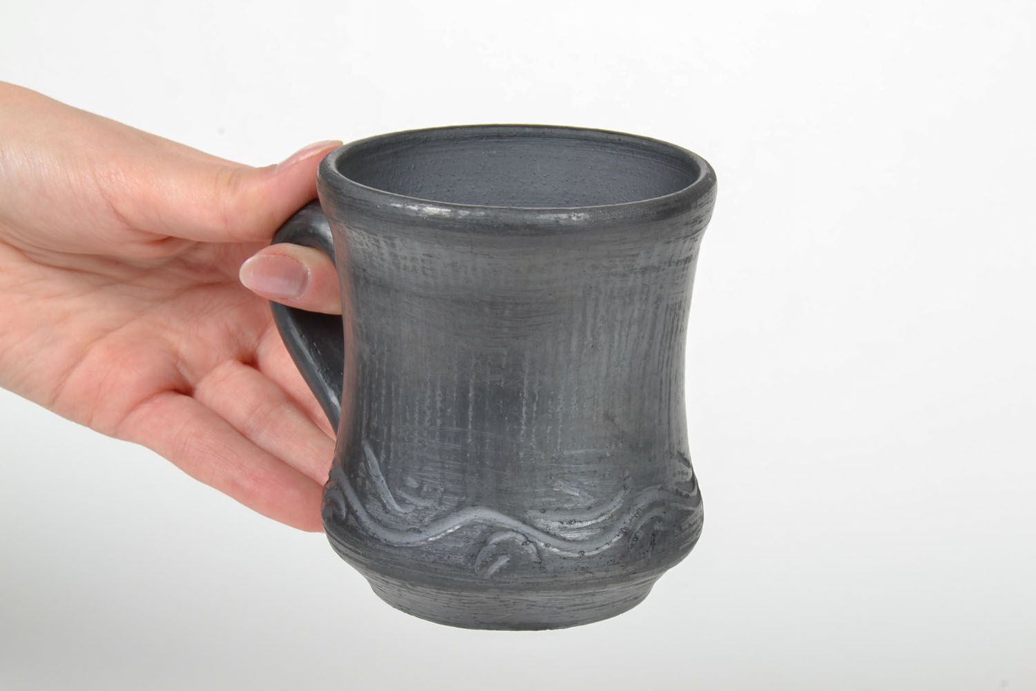 Black-smoked ceramic cup in rustic style with handle and no pattern photo 5