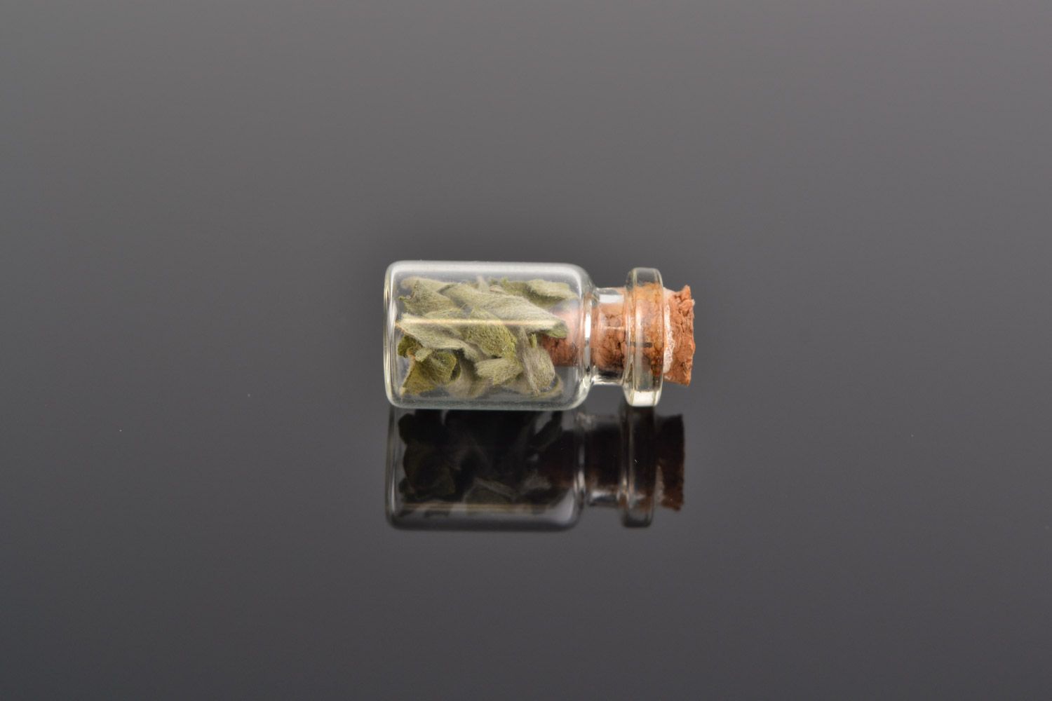 Unusual homemade neck pendant in the shape of glass flask with wormwood inside photo 1