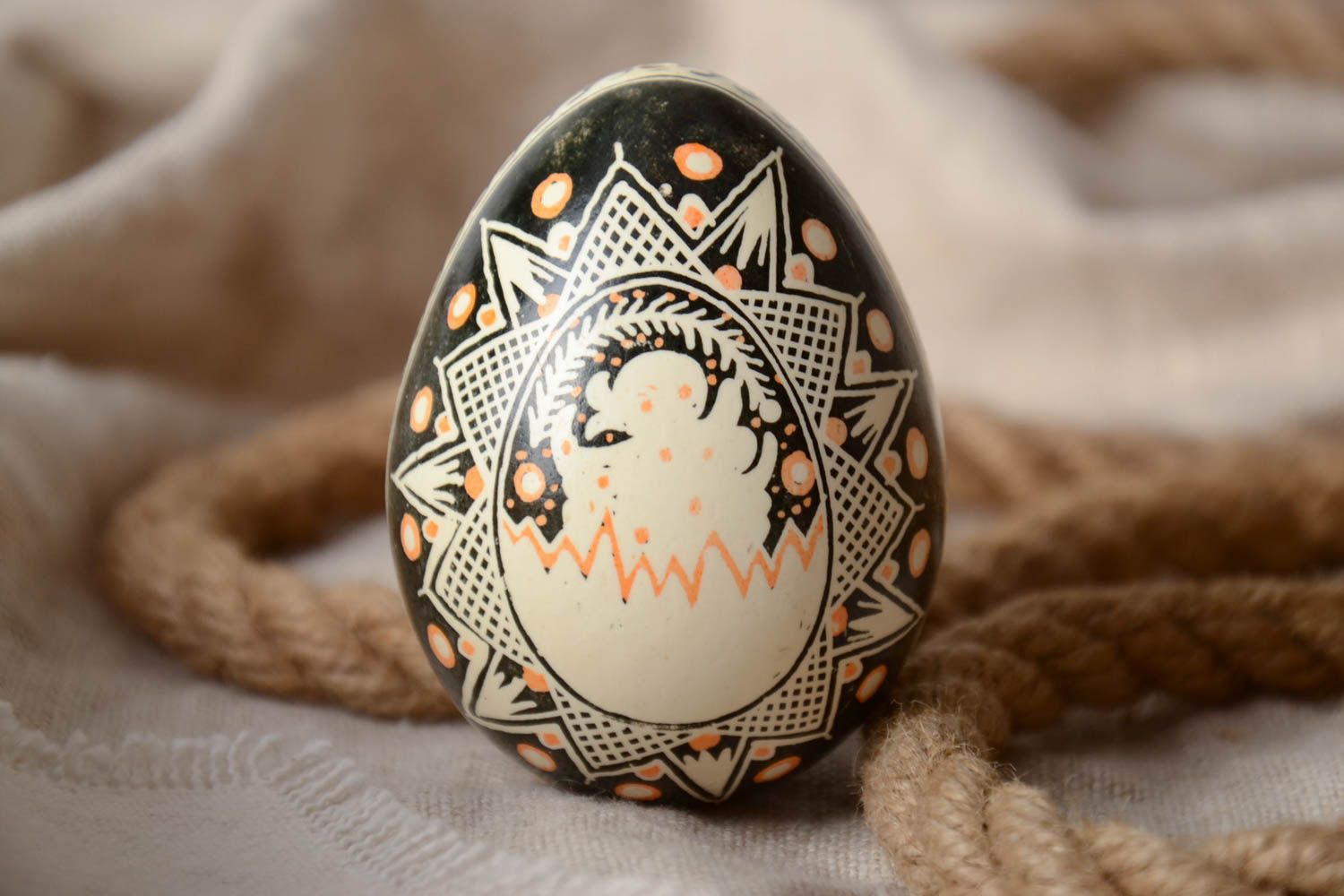 Handmade decorative souvenir Easter egg painted in black and beige colors  photo 1