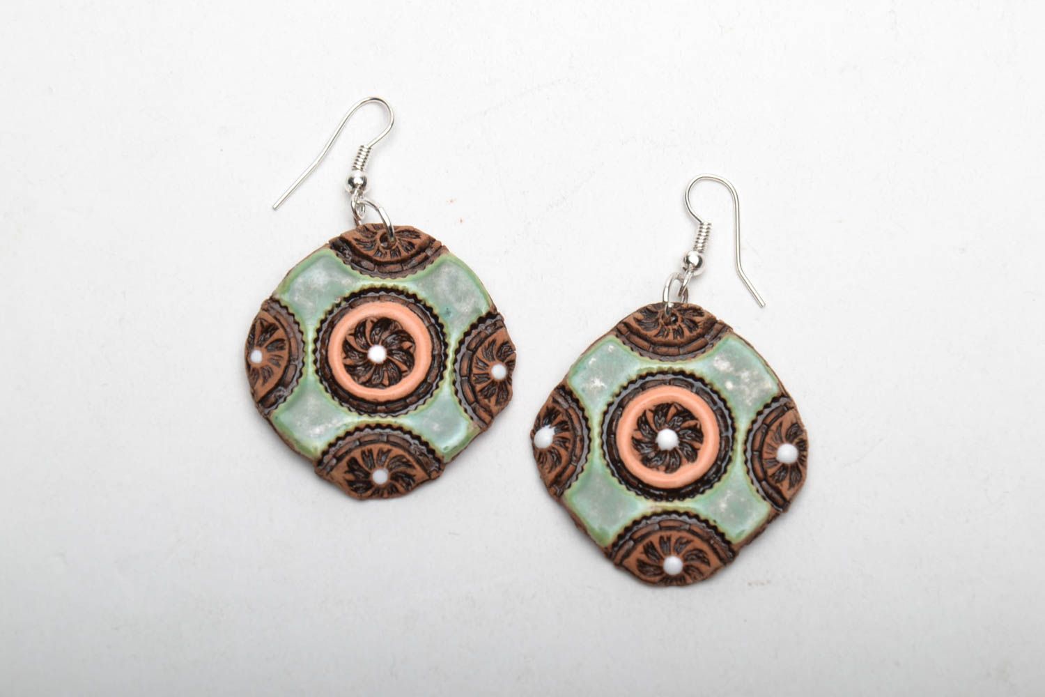 Ceramic earrings with ornament photo 3