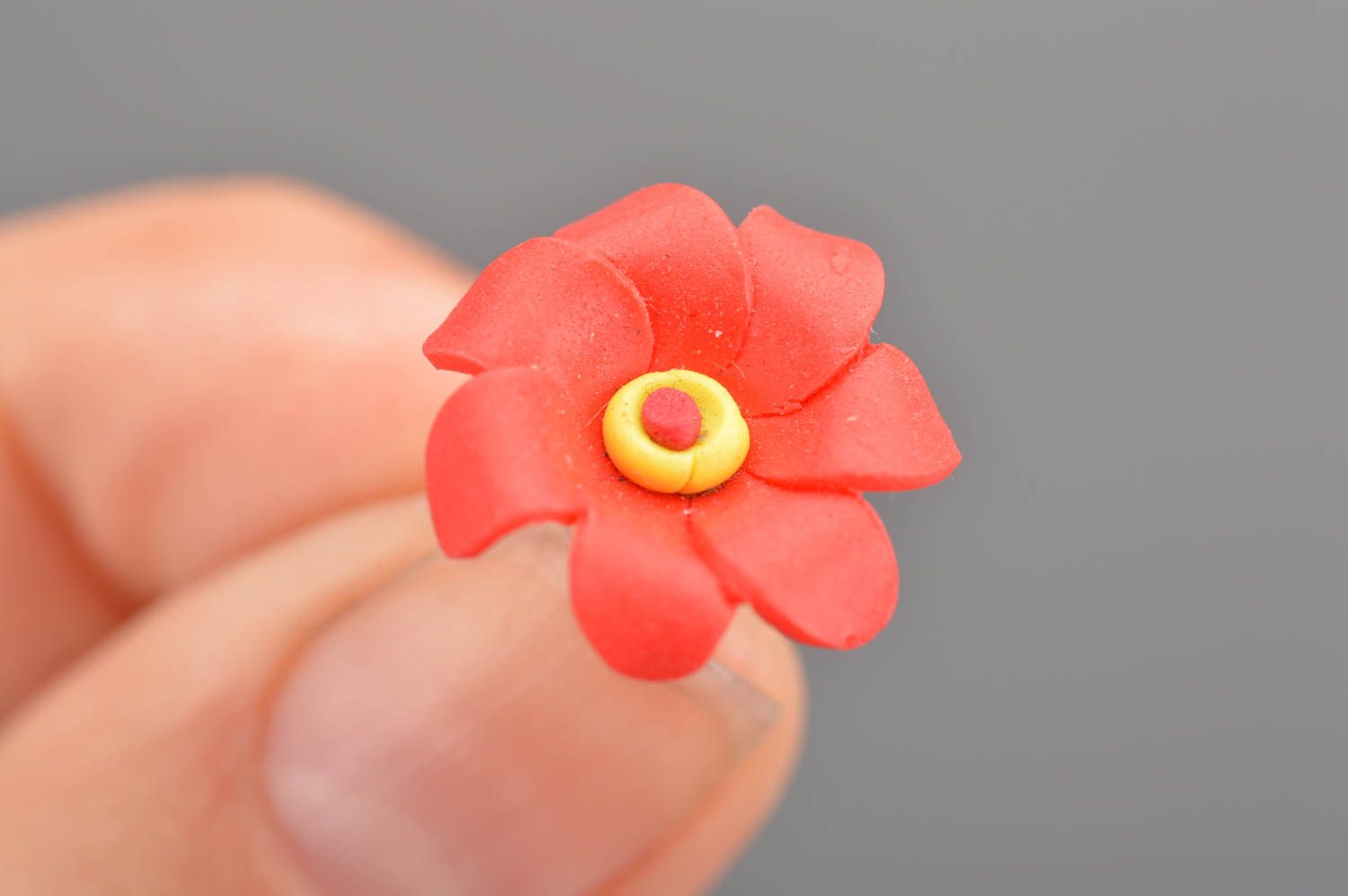 Beautiful molded polymer clay stud earrings in the shape of red flowers photo 2