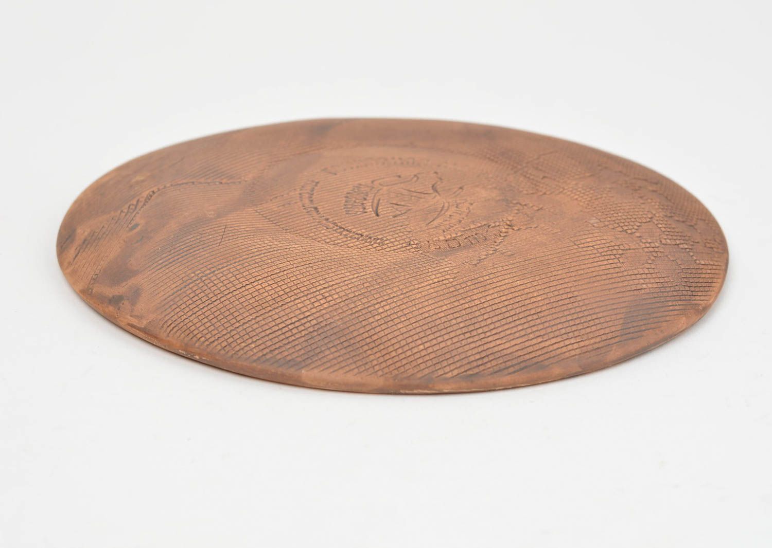 Ungewöhnlicher flacher runder brauner Unterteller mit Muster aus Ton Handarbeit foto 4