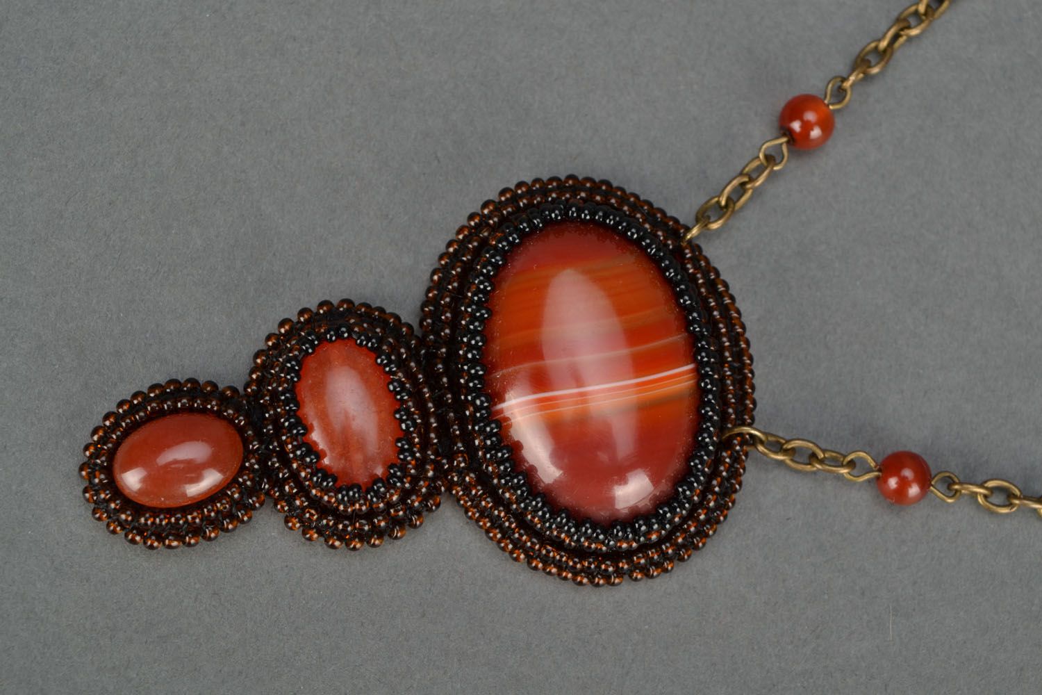 Handmade pendant with cornelian stone photo 3