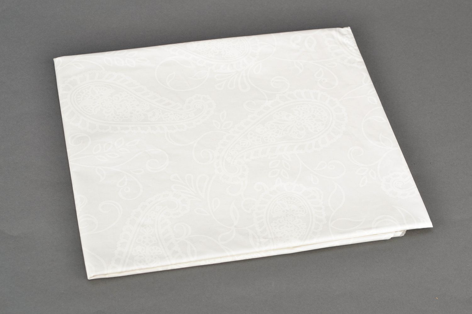 White ornamented tablecloth photo 4