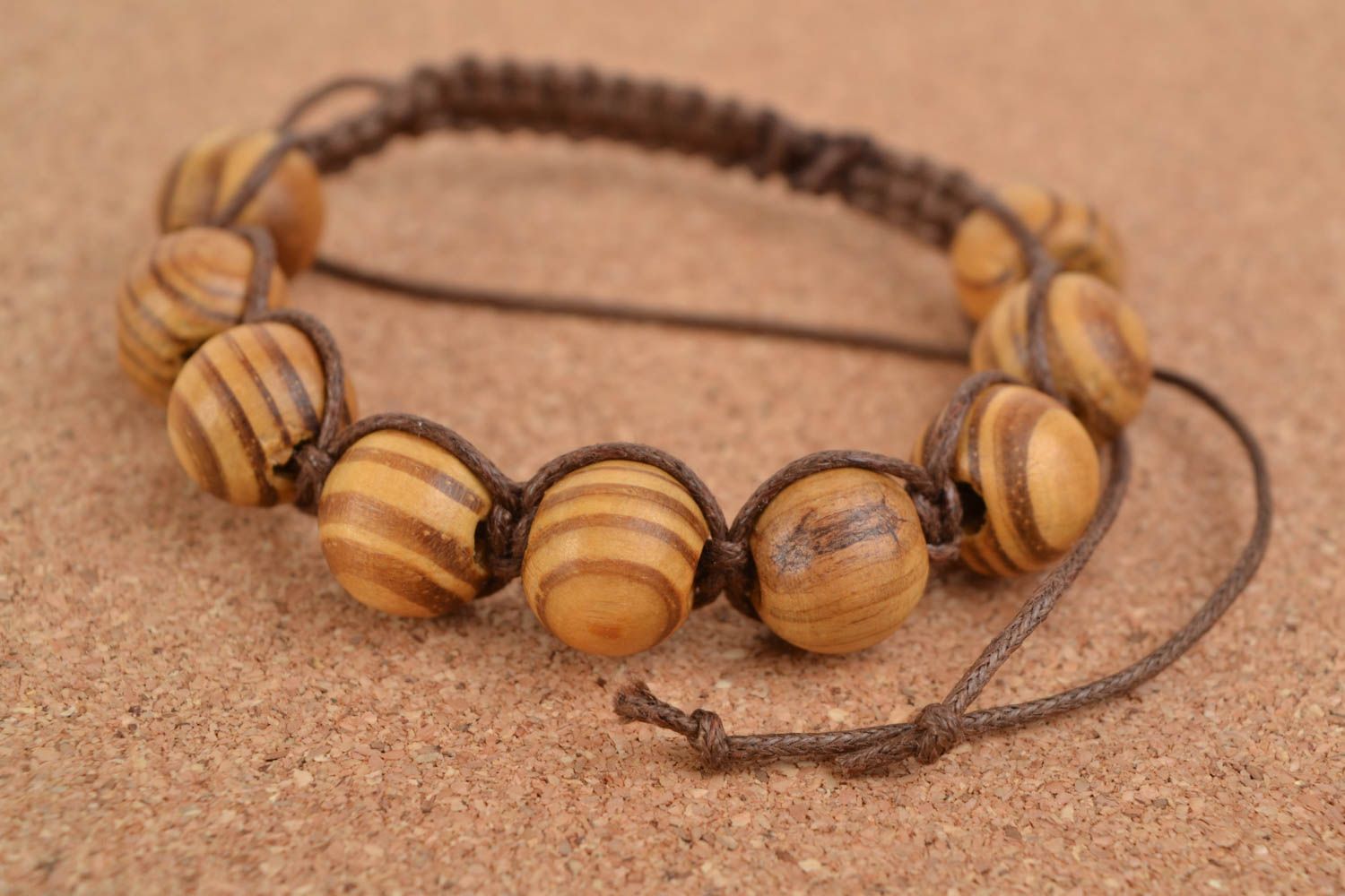 Handmade designer woven cotton cord bracelet with wooden beads photo 2