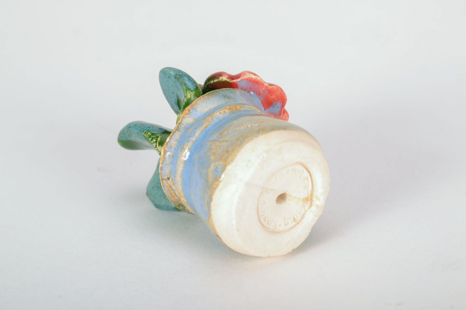 Figura de cerámica con flor foto 4