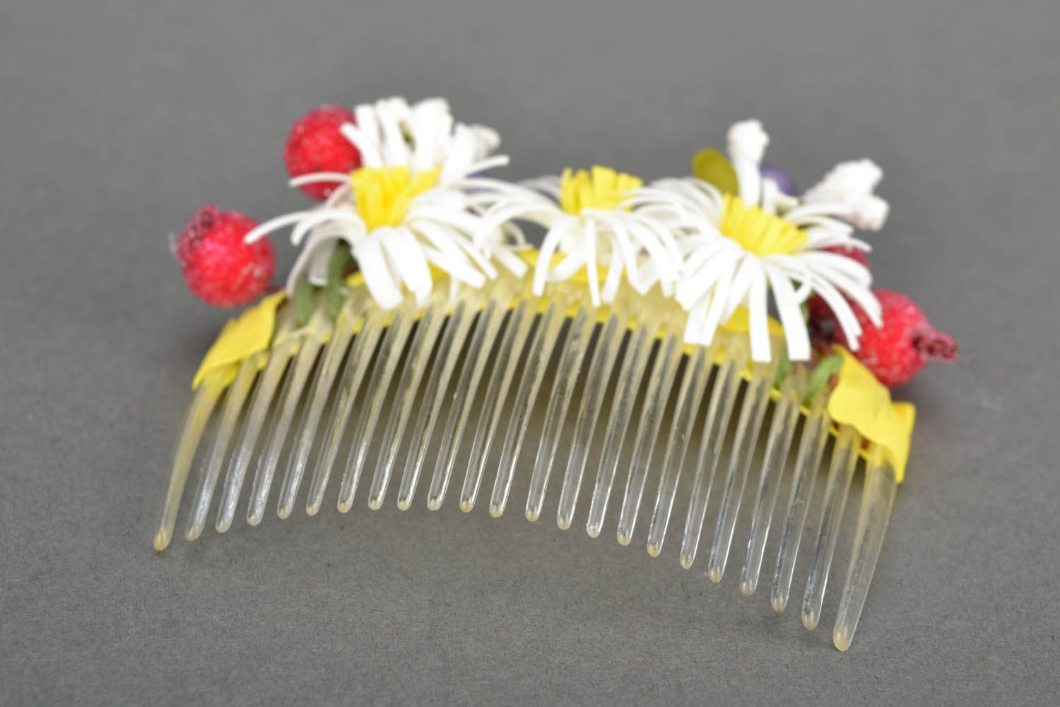 Plastic hair comb with artificial flowers photo 3