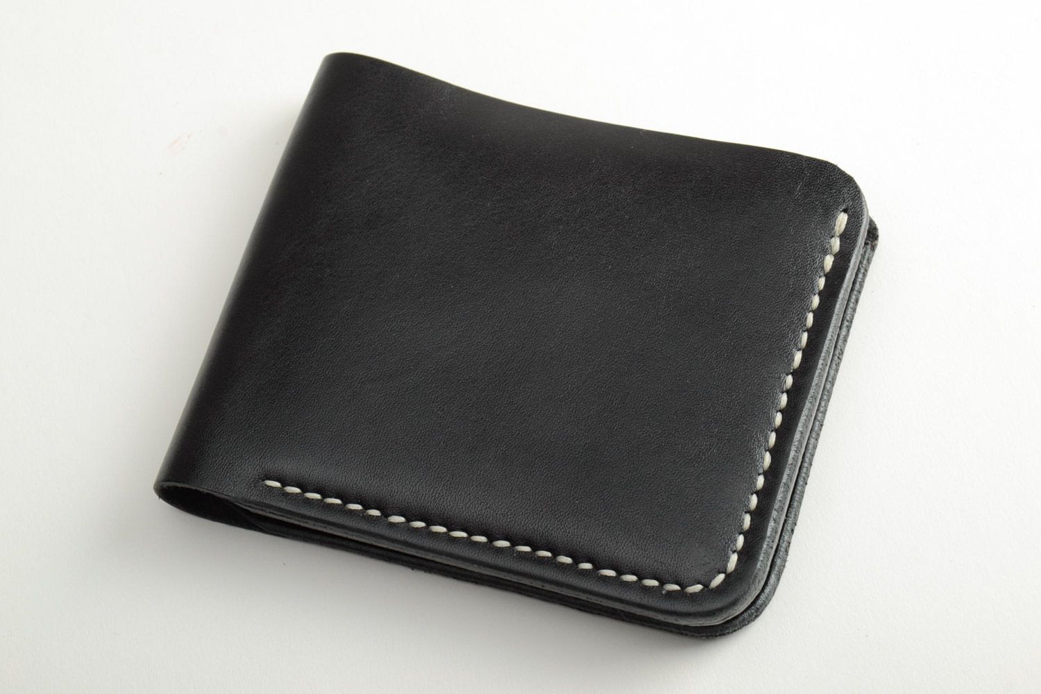 Homemade black leather men's wallet sewn with waxed thread with embossing photo 2