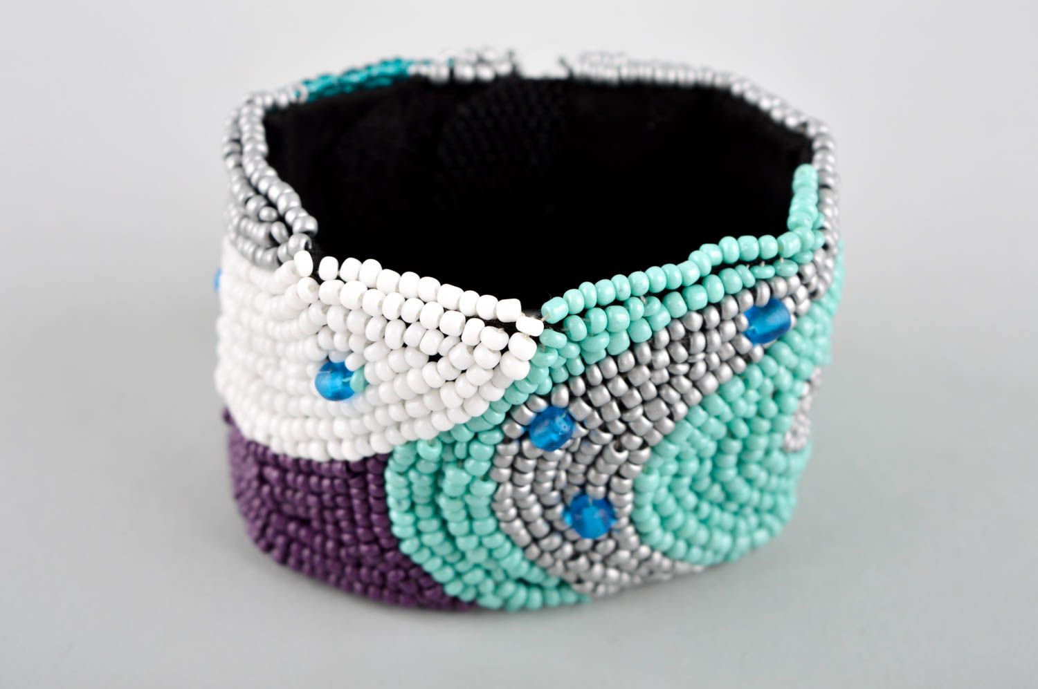 Stylish handmade beaded wide wrist bracelet in turquoise, white and black colors photo 2