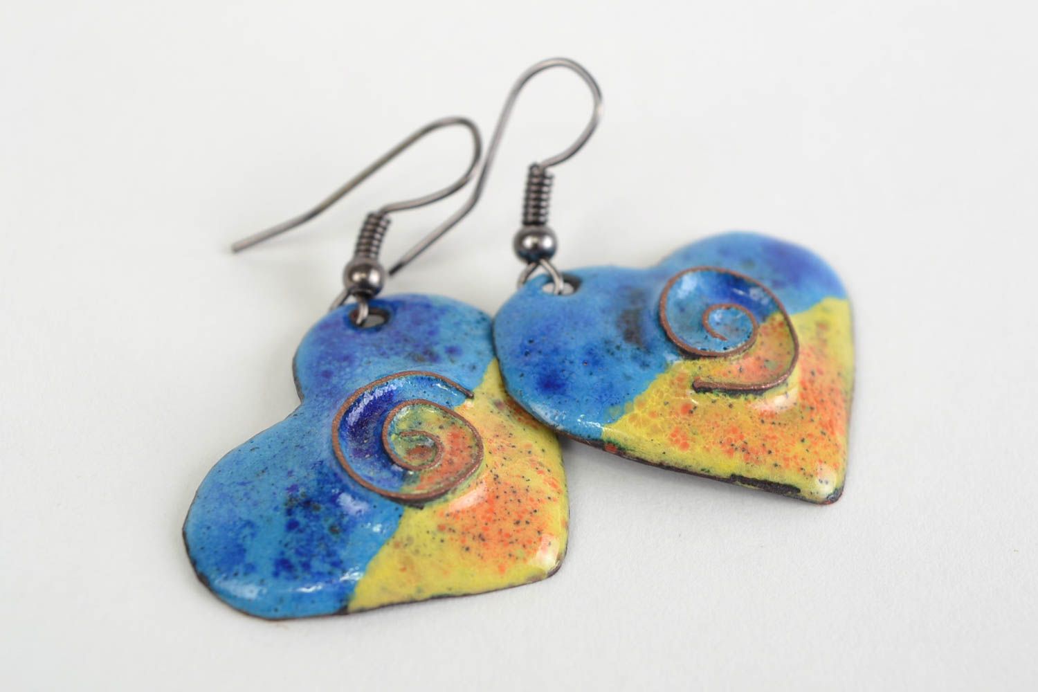 Handmade heart shaped small copper earrings with blue and yellow enamel coating photo 1