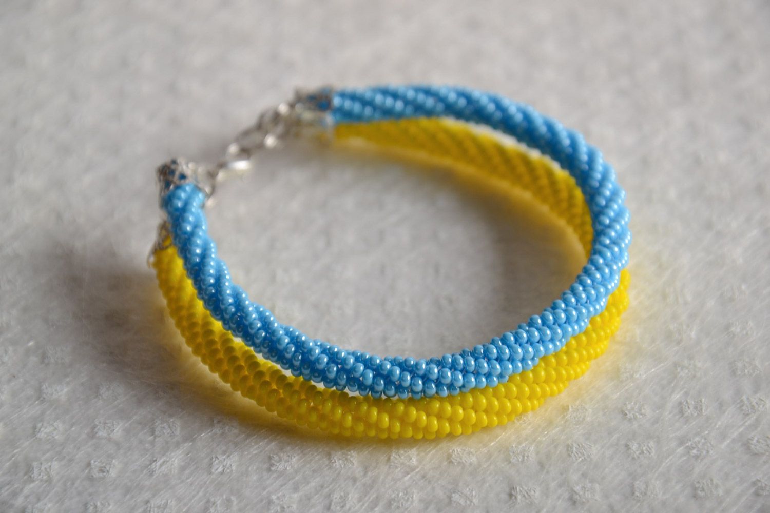 Handmade designer double cord bracelet made of Czech beads yellow with blue photo 1