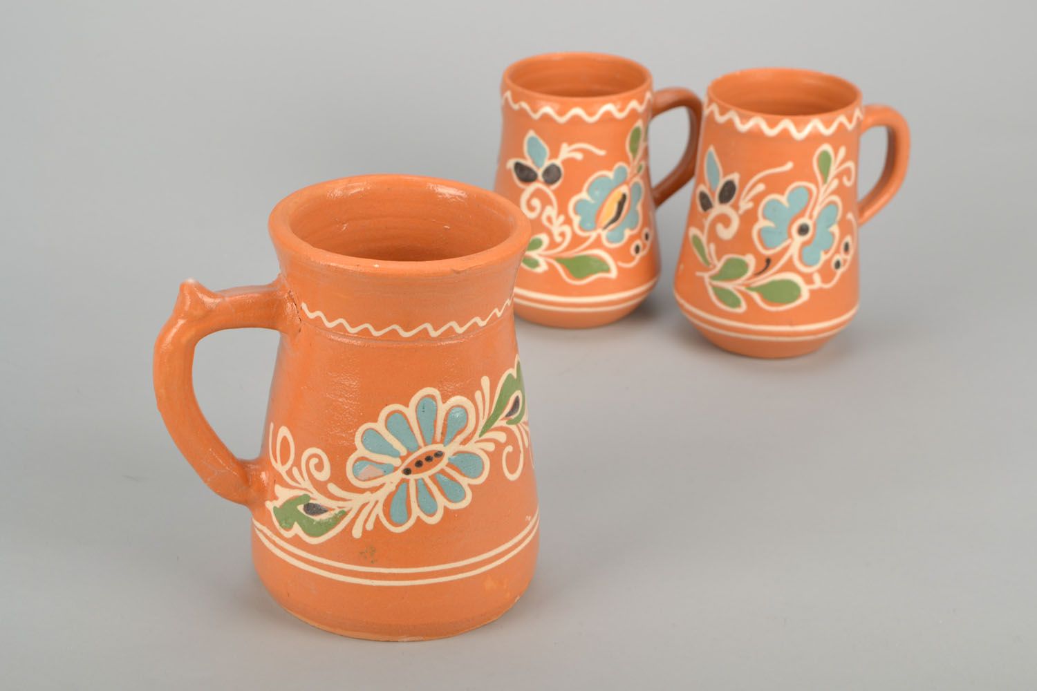 Large clay glazed beer, coffee, tea glazed cup with handle and floral pattern photo 1