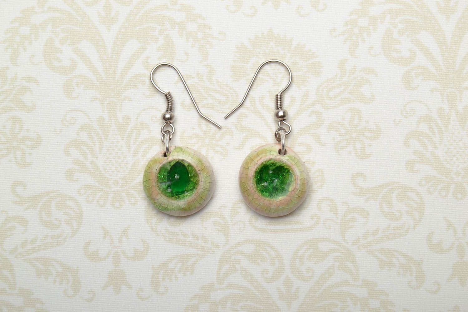 Round ceramic earrings with colorful glass of green color photo 1
