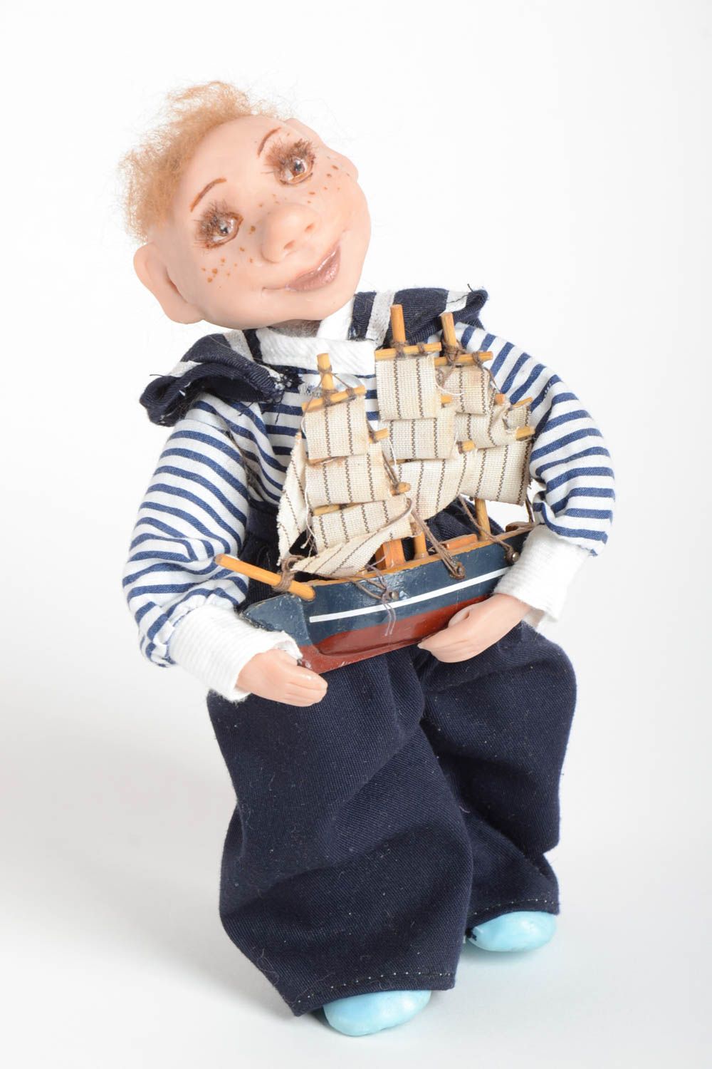 Авторская скульптурная кукла Мальчик в тельняшке с кораблем для декора хенд мейд фото 2