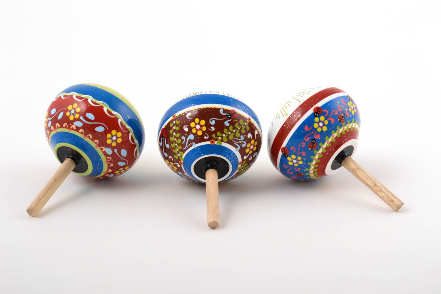Trompos de madera artesanales regalo original juguetes para niños con ornamentos foto 2