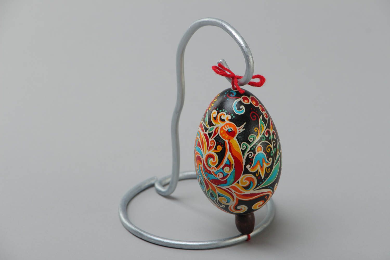 Handmade decorative Easter egg painted with wax and food dyes with metal stand photo 2