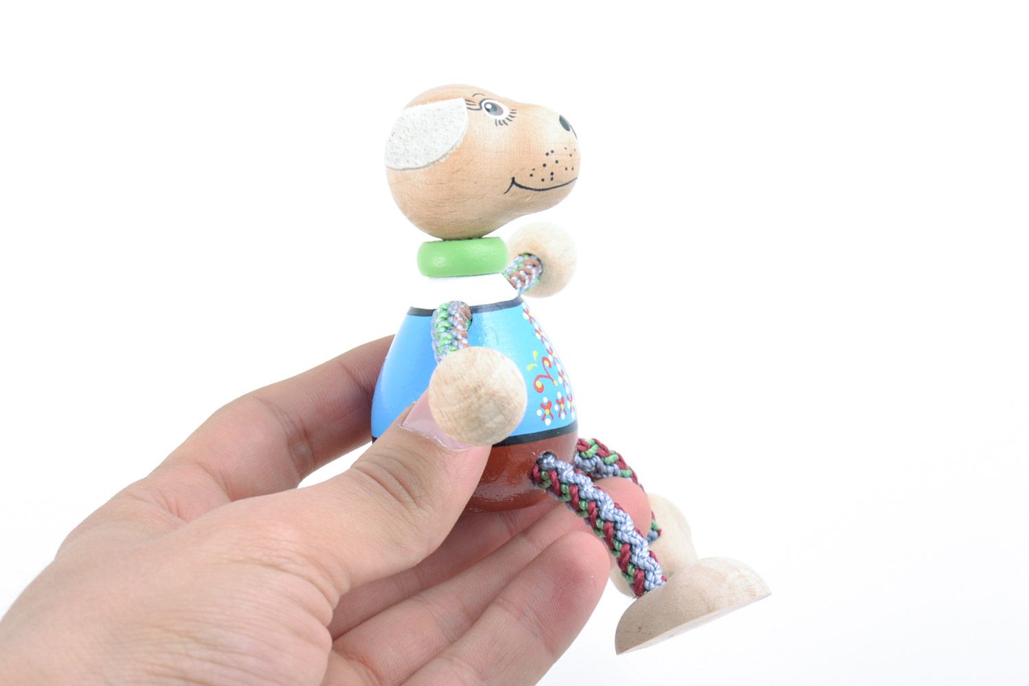 Wooden handmade decorative dog toy in embroidered shirt painted with eco friendly dyes photo 2