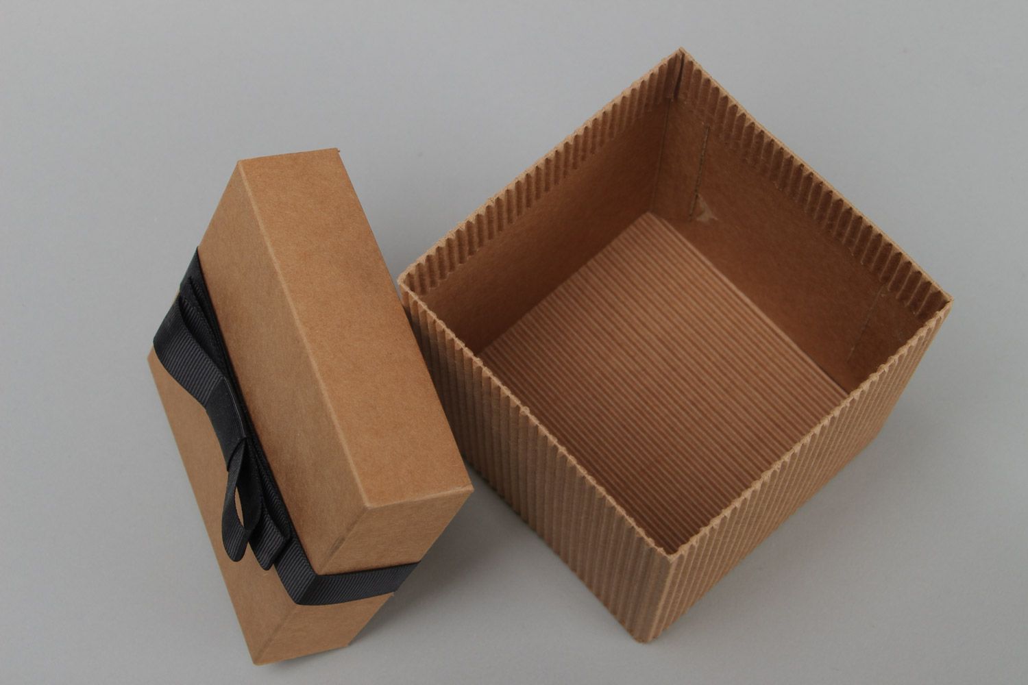 Handmade stylish corrugated carton gift box with black rep ribbon bow on lid photo 4