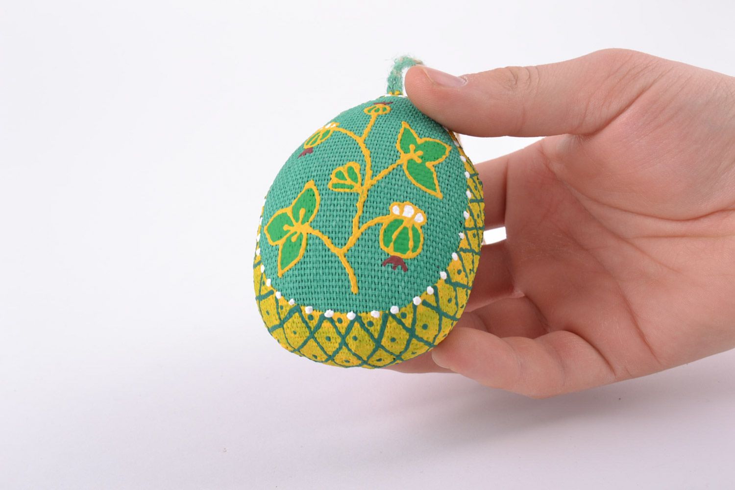Homemade decorative soft wall hanging Easter egg of green color with ornaments photo 5