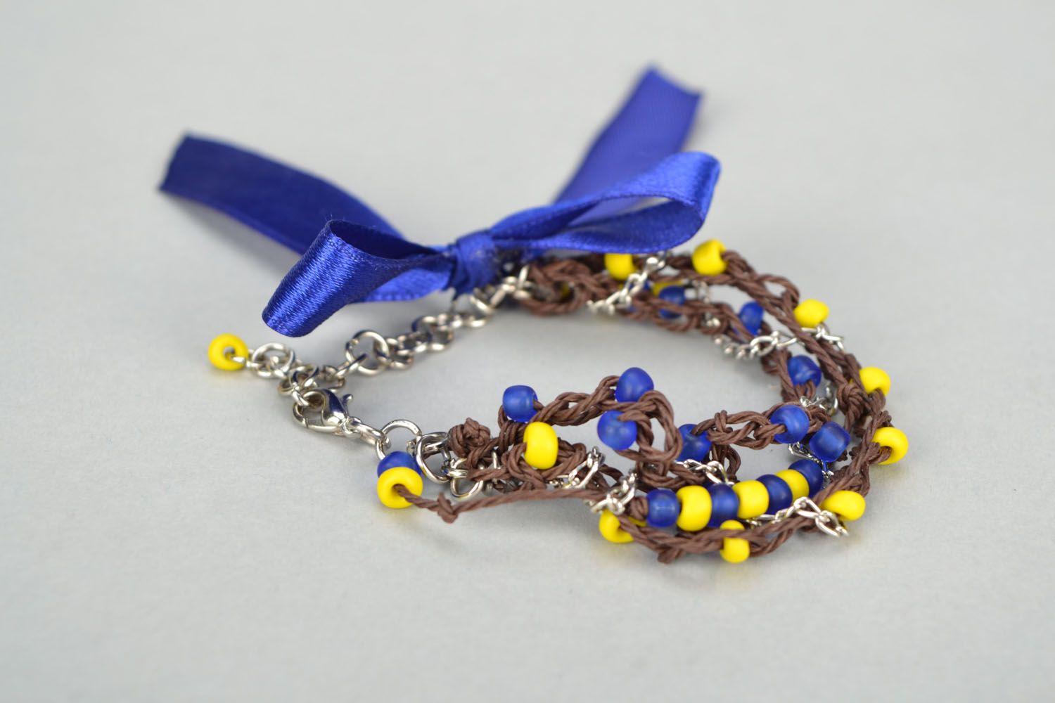 Wrist bracelet with satin ribbons photo 3