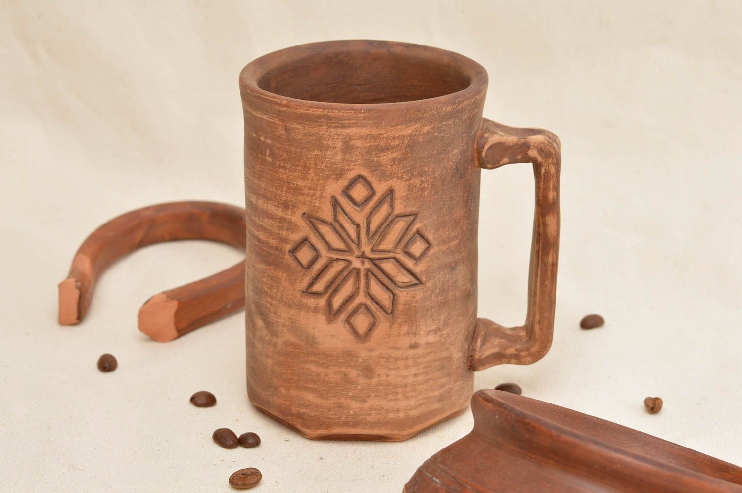 Clay tall handmade 8 oz coffee or tea cup with square handle and snow flake pattern photo 1