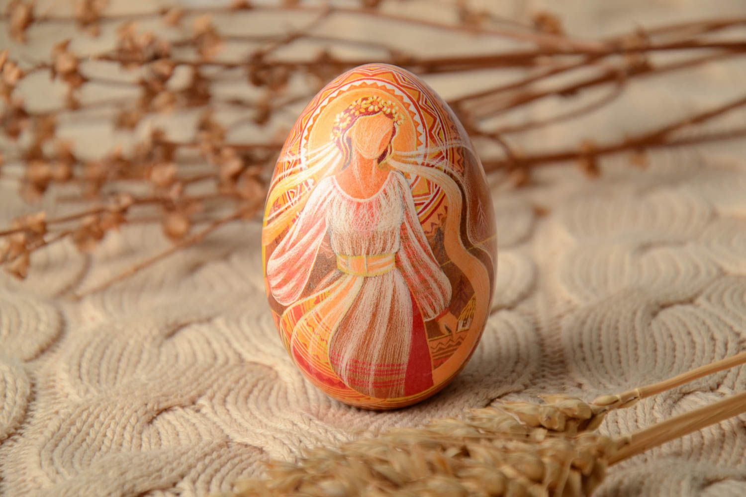 Painted Easter egg decorated with carving photo 1