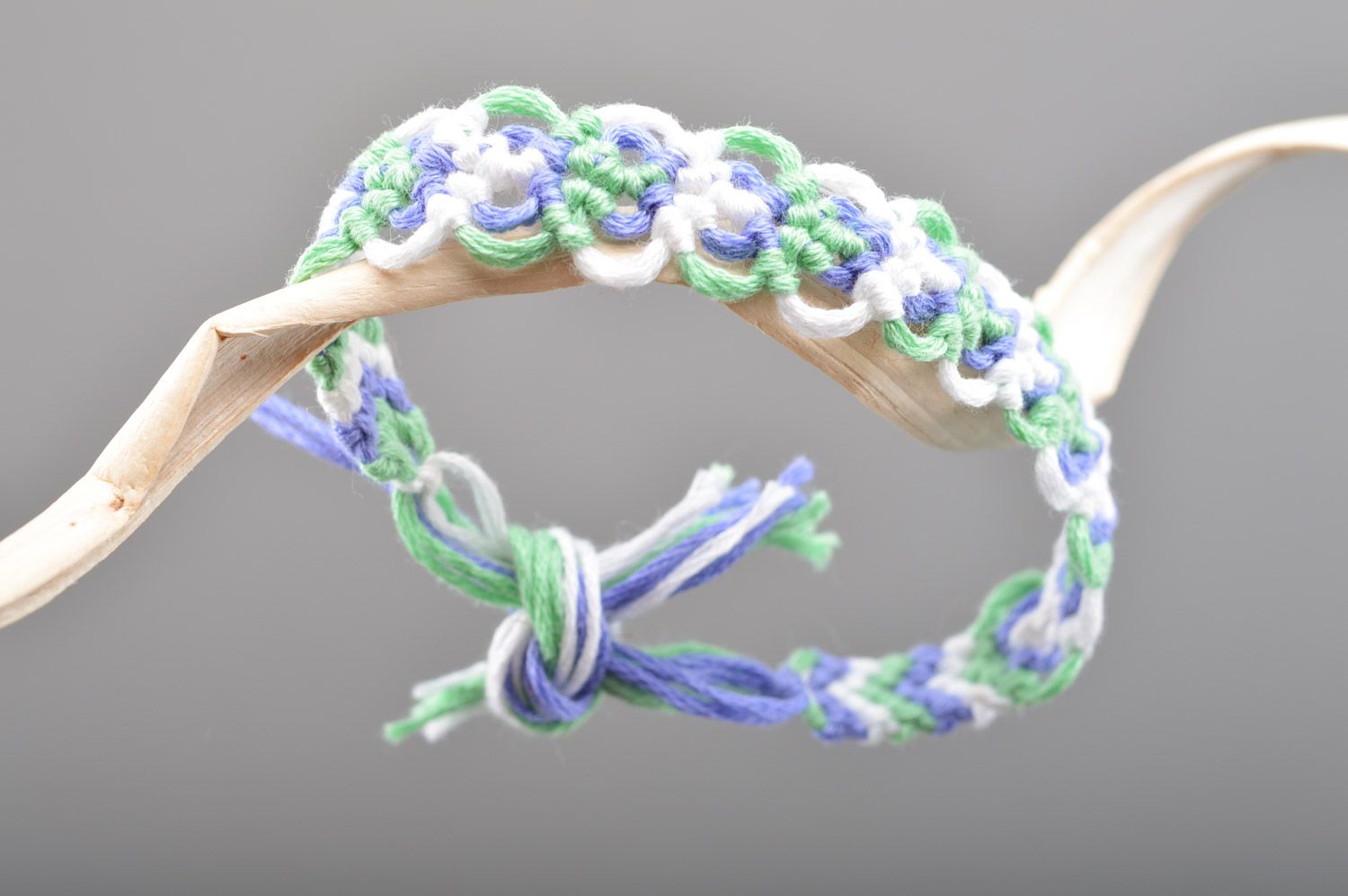 Thin handmade friendship wrist bracelet woven of embroidery floss in tender colors photo 5