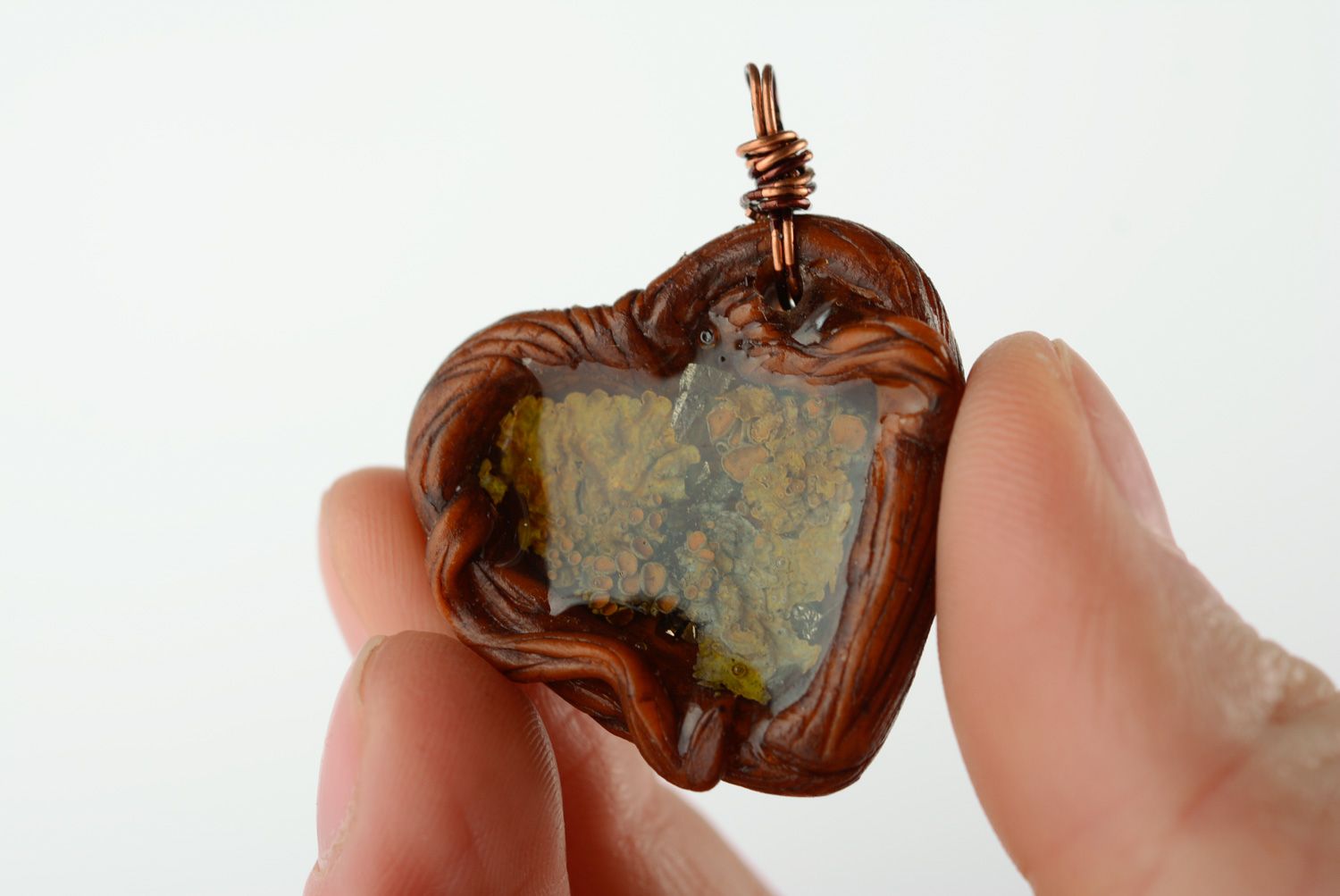 Beautiful homemade neck pendant with moss inside coated with epoxy Heart photo 2