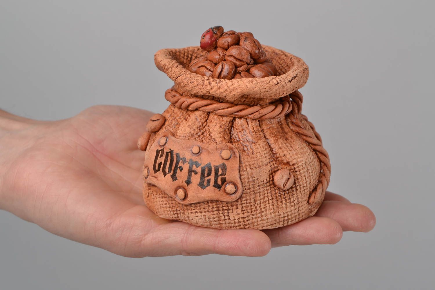 Unusual vessel for free-flowing ingredients in shape of sack for coffee photo 2