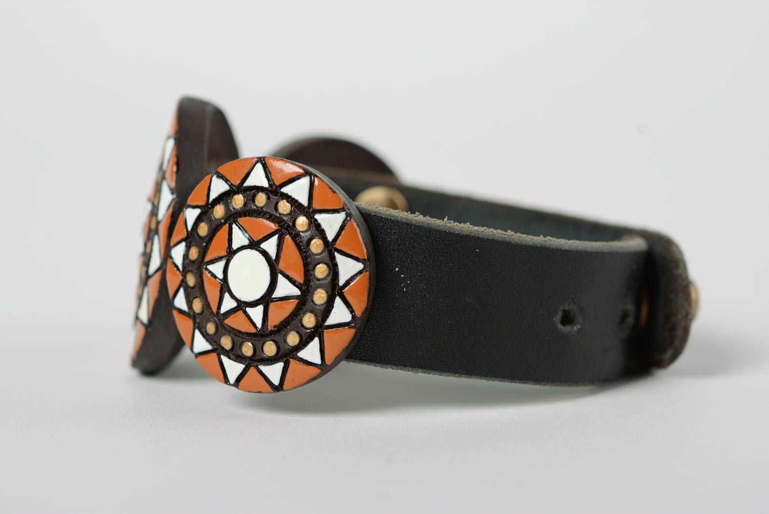 Handmade designer ornamented clay bracelet painted with enamel and equipped with leather strap photo 4