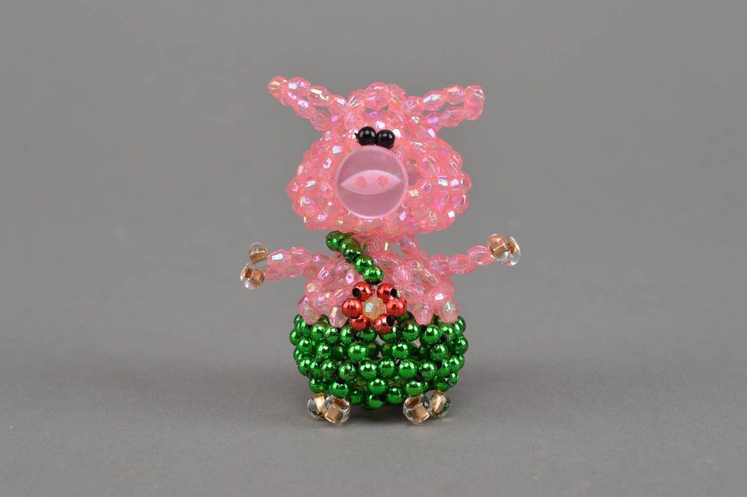 Small handmade designer pink beaded figurine of pig in green pants home decor photo 4