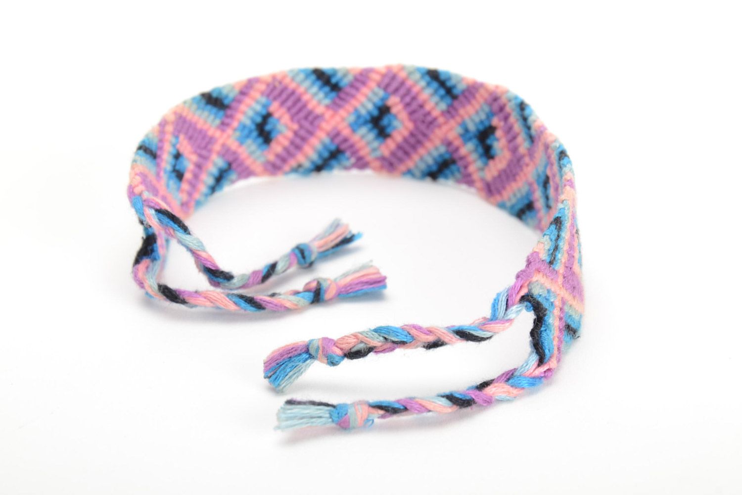 Handmade friendship wrist bracelet woven of threads with bright ornament and ties photo 3