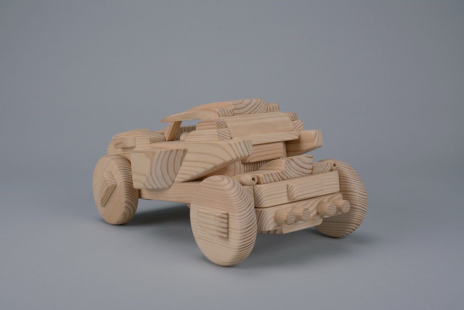 Little car made of wood photo 1