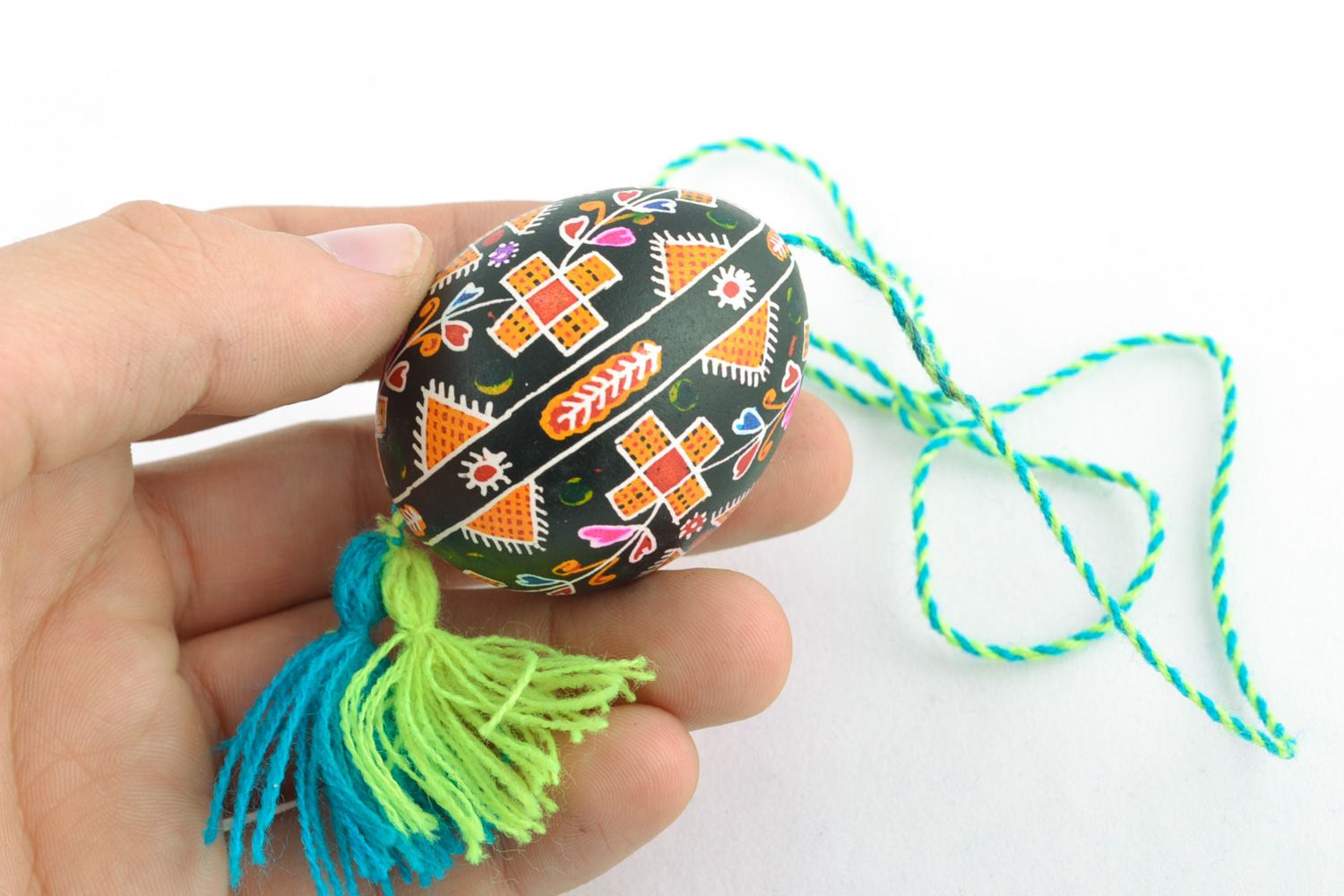 Handmade hanging Easter egg with ornament and tassels for interior decoration photo 2