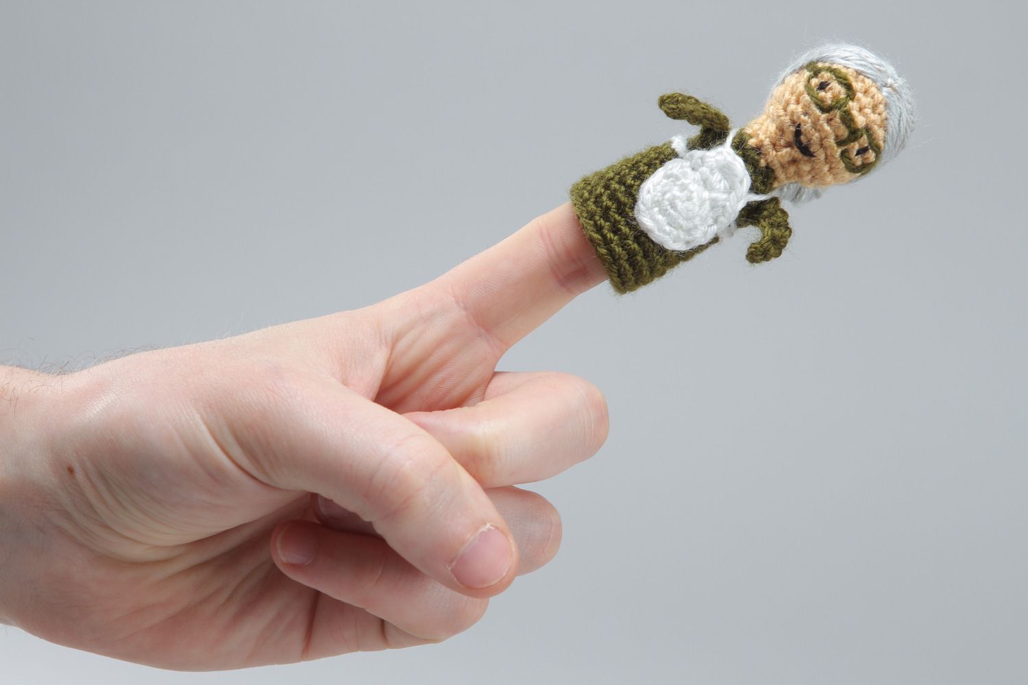 Handmade finger puppet toy in the shape of old woman crocheted of acrylic threads photo 4