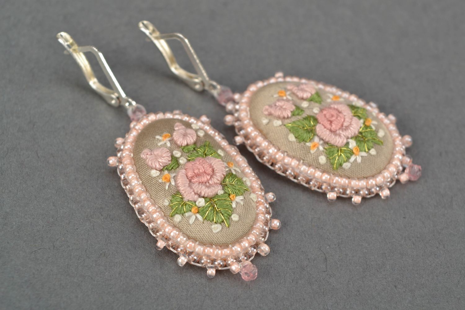 Festive dangle earrings with embroidery photo 1